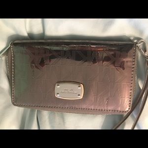 Metallic silver wristlet
